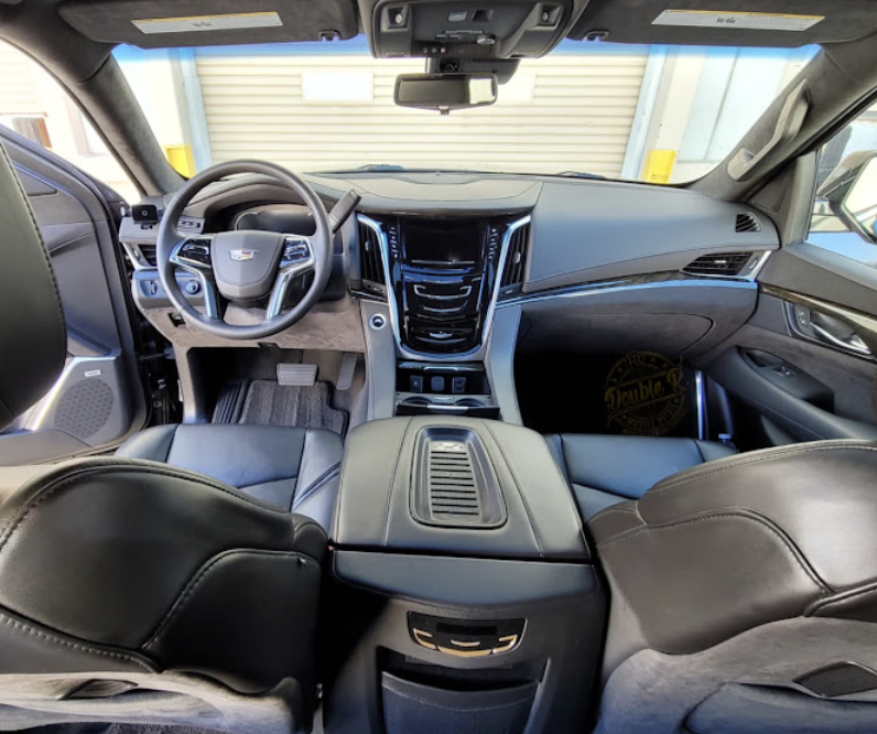 Spotless dashboard, steering wheel and center console after interior detailing