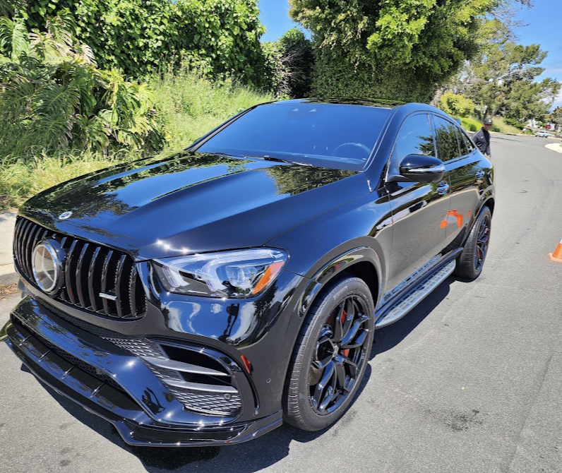 Black Mercedes-AMG GLE coupe with a deep mirror-gloss paint finish